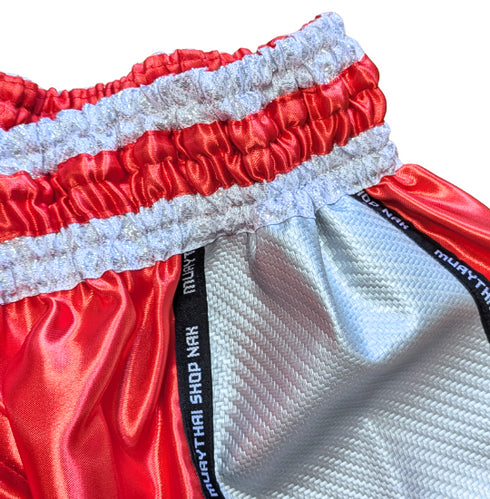 ムエタイショップNAKオリジナルのオーダーキックパンツ(ショート丈)レッドxシルバー、刺繍カスタム対応