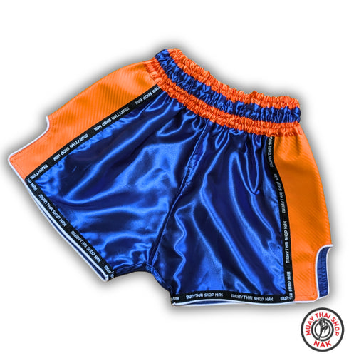 オーダーキックパンツ(ショート丈)ブルーxオレンジ、サテン生地とSyntheticレザーを使用したカスタムパンツ