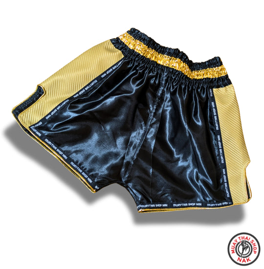 オーダーキックパンツ(ショート丈)ブラックxゴールド、サテン生地とSyntheticレザーを使用したカスタムパンツ